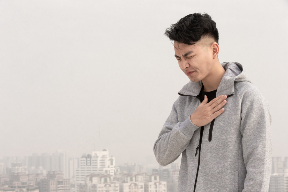 Asian Man Feel Pain On Lung And Suffer From Air