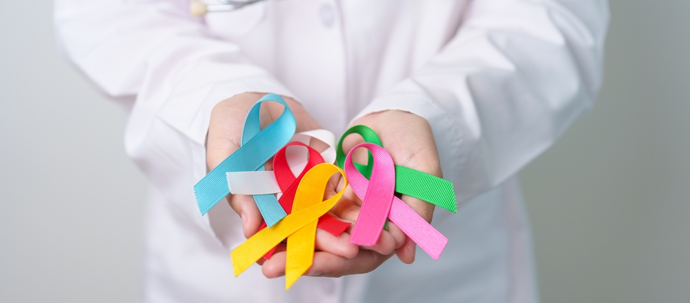 World Cancer Day February4 Doctor Holding Blue Red Green