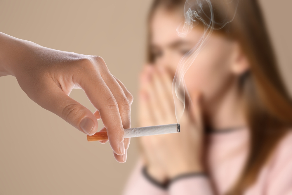 Passive Smoking Girl Coughing Because Of Woman Smoking Nearby On