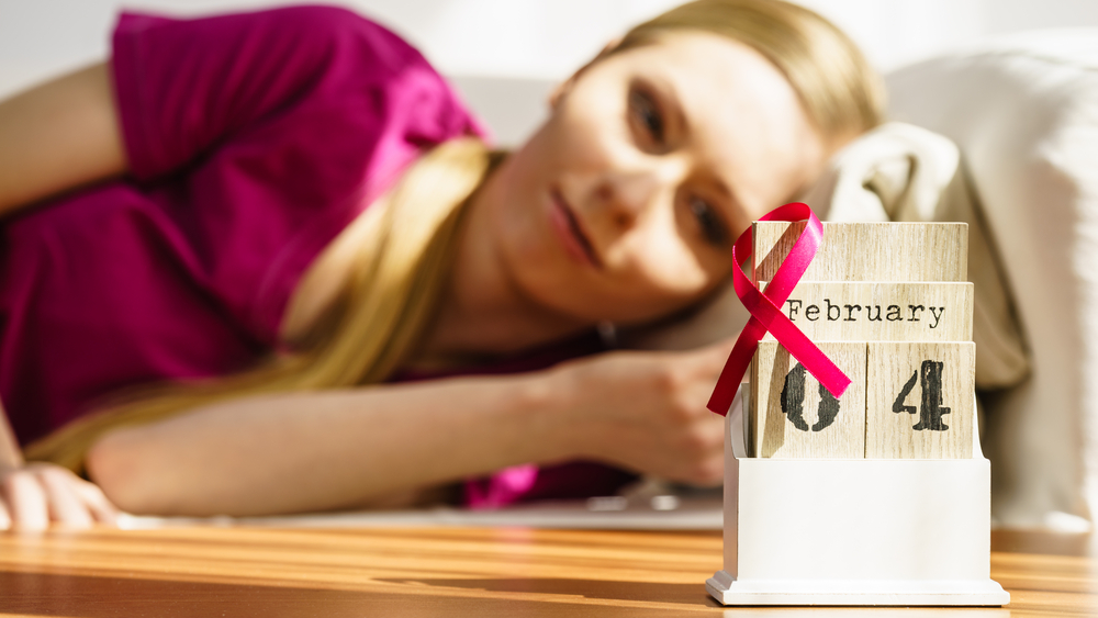 Woman Lying Bed Looking At Calendar It Is 4
