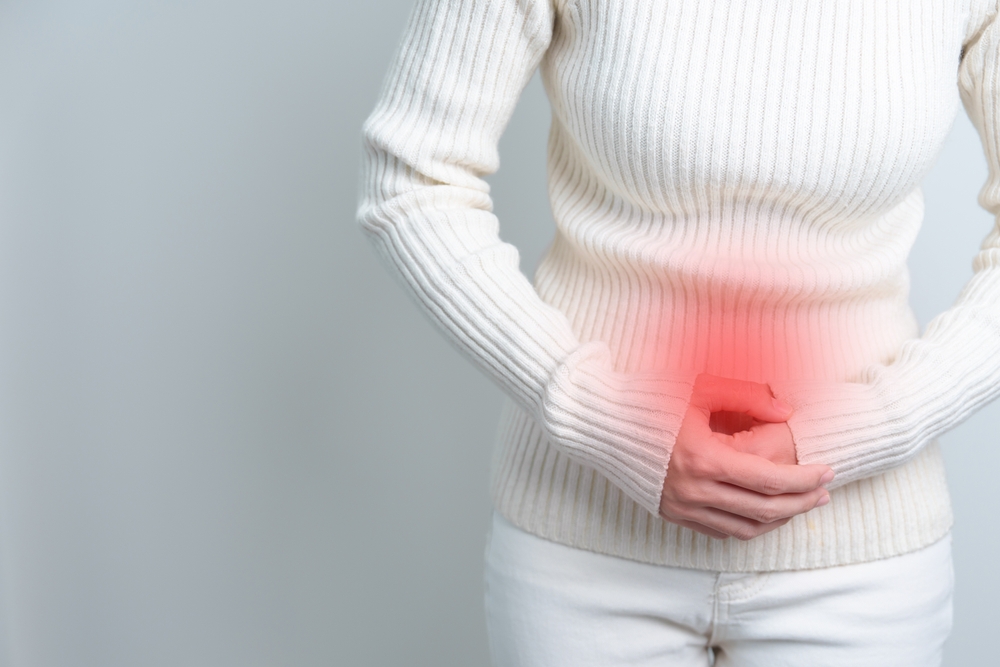 Woman Having Stomach Pain. Ovarian And Cervical Cancer Cervix Disorder