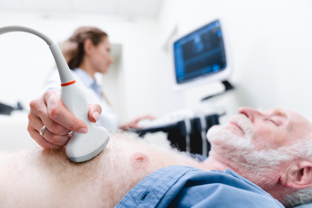 Close Up Of An Aged Male Patient Being Examined