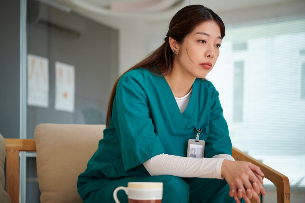 Stressed Frustrated Nurse Thinking About Patient She Lost In Surgery