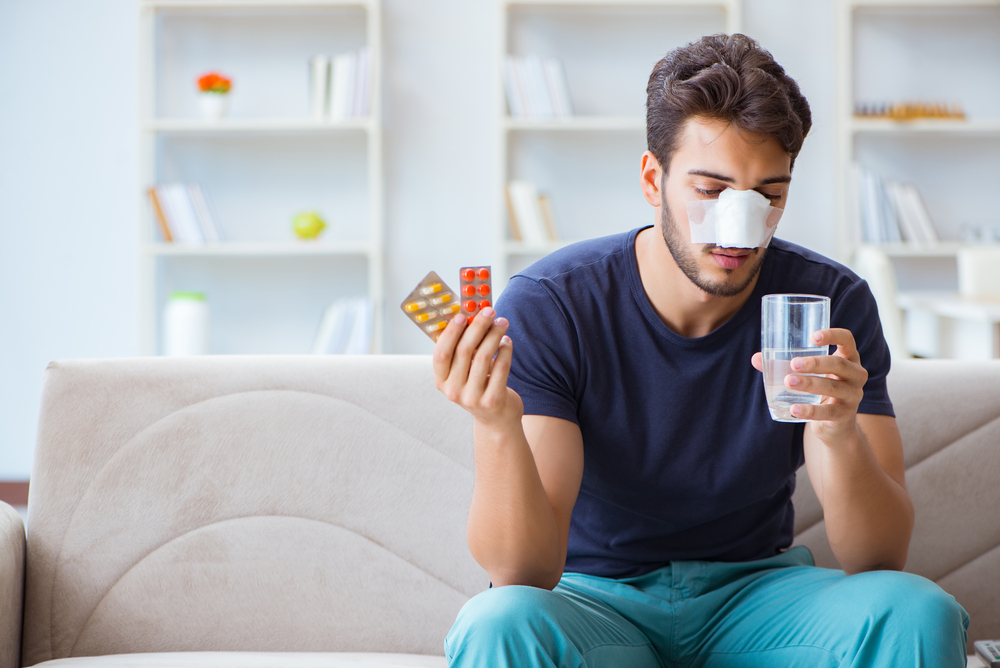 Young,Man,Recovering,Healing,At,Home,After,Plastic,Surgery,Nose Young Man Recovering Healing At Home After Plastic Surgery Nose