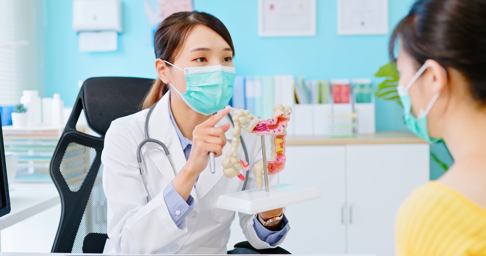 Asian Woman Wears Face Mask To Prevent Covid19 Has Colorectal