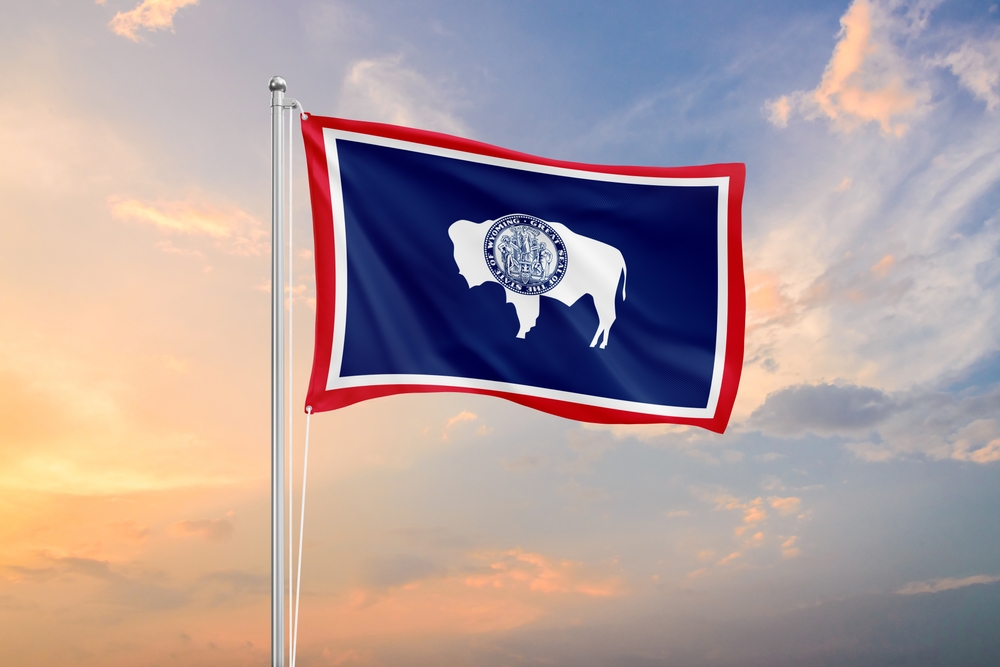 Wyoming,Flag,Waving,On,Sundown,Sky Wyoming Flag Waving Sundown Sky